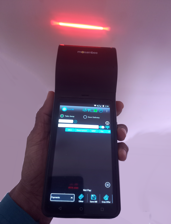Queue Busting handheld device with barcode scanner, printer and payments