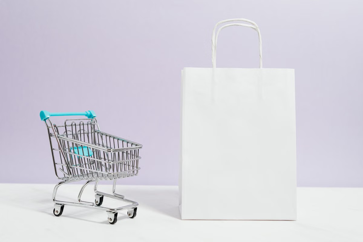 Shopper using a mobile device while browsing a retail store